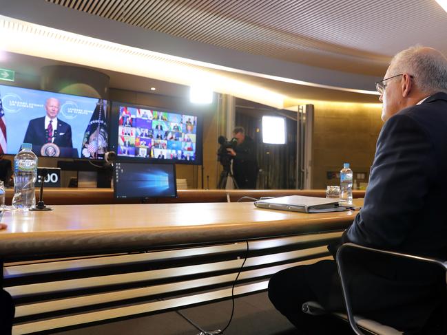 SYDNEY, AUSTRALIA - NewsWire Photos APRIL 22, 2021 - Prime Minister Scott Morrison listens to President BidenÃs virtual address from the Sydney Commonwealth Parliament Offices.Picture: NCA NewsWire / Christian Gilles