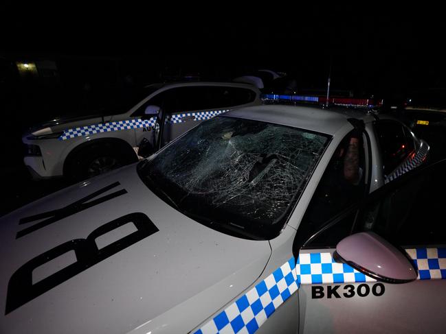 Photos on the night of the Wakeley riots where hundreds of people descended on the Good Shepherd Church on Box Road in Wakeley.