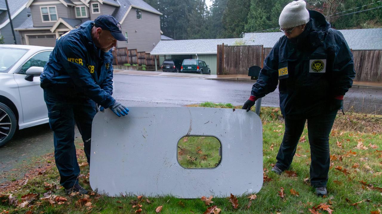 The door plug from Alaska Airlines Flight 1282 after being found in Portland, Oregon. (Photo by National Transportation Safety Board / AFP)