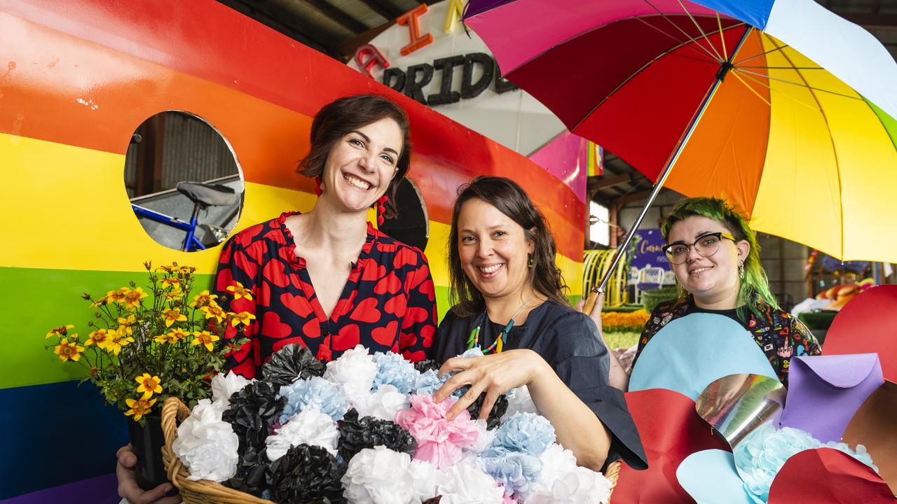 Helping prepare the Pride float are (from left) Courtney Ruler, Annette Bromdal and Mickey Berry for the grand parade of Carnival of Flowers 2022. The float is supported by MOSAIC and Carers Queensland. Picture: Kevin Farmer