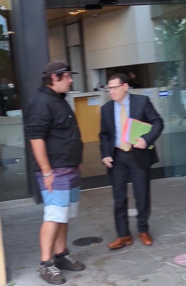 Simon Blizzard (left) with lawyer Richard Zande outside Ipswich Court on August 18, 2023.