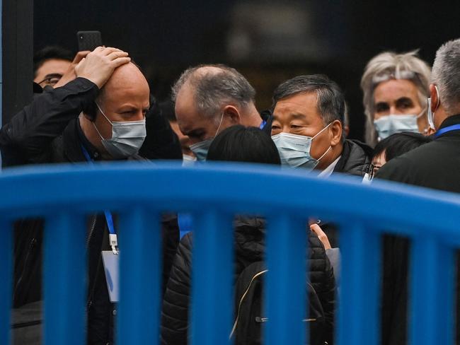 Members of the World Health Organisation team visit the closed Huanan Seafood wholesale market in Wuhan, China. Picture: AFP