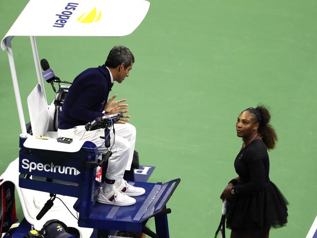 Carlos Ramos and Serena Williams square off (Photo by Al Bello/Getty Images)