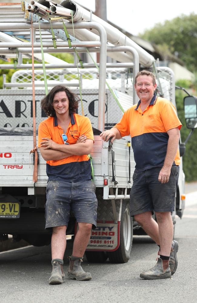 Plumber Patrick Moriarty with apprentice Zachary Markwell in Mosman. Picture: Tim Hunter.