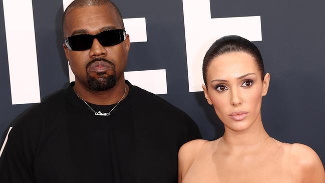 PIXELATED VERSIONS -  LOS ANGELES, CALIFORNIA - FEBRUARY 02: (EDITOR'S NOTE: Image contains nudity.) L-R, Kanye West and Bianca Censori attend the 67th Annual GRAMMY Awards on February 02, 2025 in Los Angeles, California.  (Photo by Matt Winkelmeyer/Getty Images for The Recording Academy)