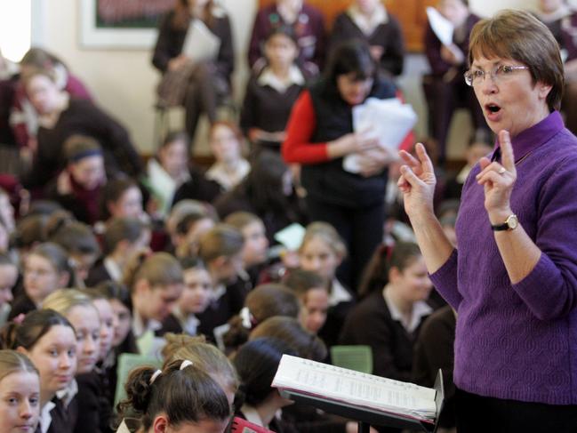 Ogilvie High School choir members rehearse under the direction of Joan Wright in 2004. Picture: Tony Palmer