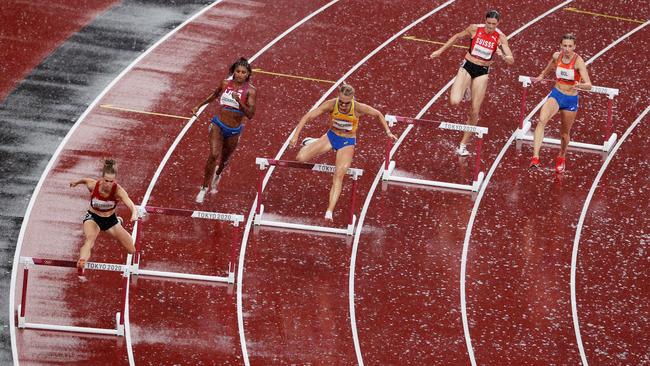 A downpour drenched the stadium. Picture: Patrick Smith/Getty Images