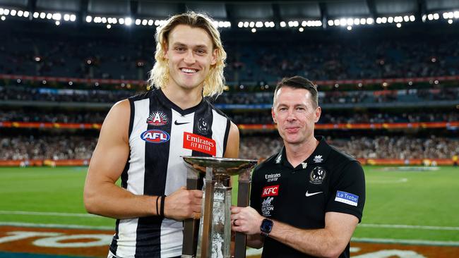 Darcy Moore of the Magpies and Craig McRae, Senior Coach of the Magpies. Picture: Dylan Burns