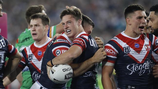 Sam Verrills celebrates with his Roosters teammates after scoring a try. Picture: Getty Images