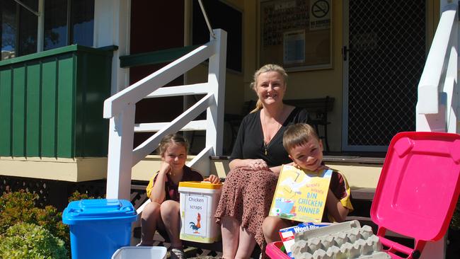 Roadvale State School Early Years Teacher Kylie Peel showcasing the school's waste reduction activities with PiPs representatives Jessica Laegel and Fraser Hawkins with their 'Bin Chicken'. Photo: contributed.