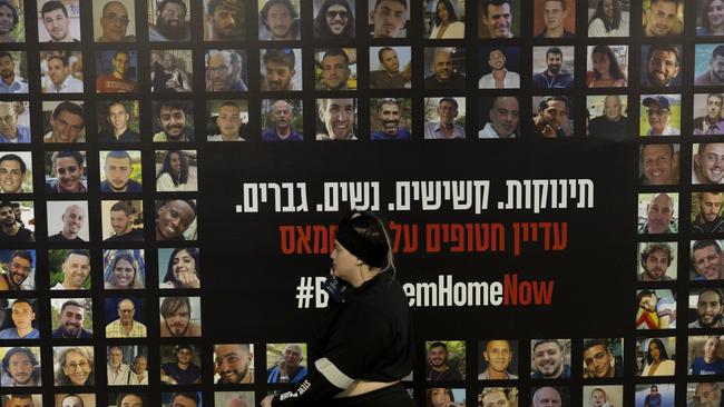 A wall covered with photos of hostages held by Hamas in the Gaza Strip, on December 28, 2024 in Tel Aviv, Israel. Picture: Getty