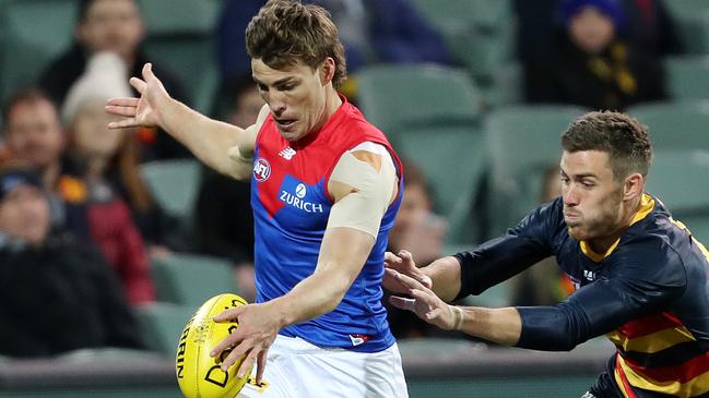 Geelong is considering a move for free agent Jack Viney to bolster its midfield.