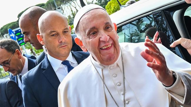 Pope Francis addresses the media as he leaves the Gemelli hospital. Picture: AFP