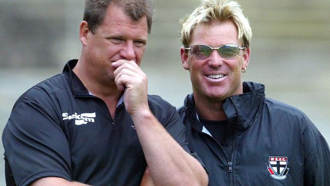 Shane Warne chats with then-Saints’ coach Grant Thomas (left) in 2003. Picture: George Sal.