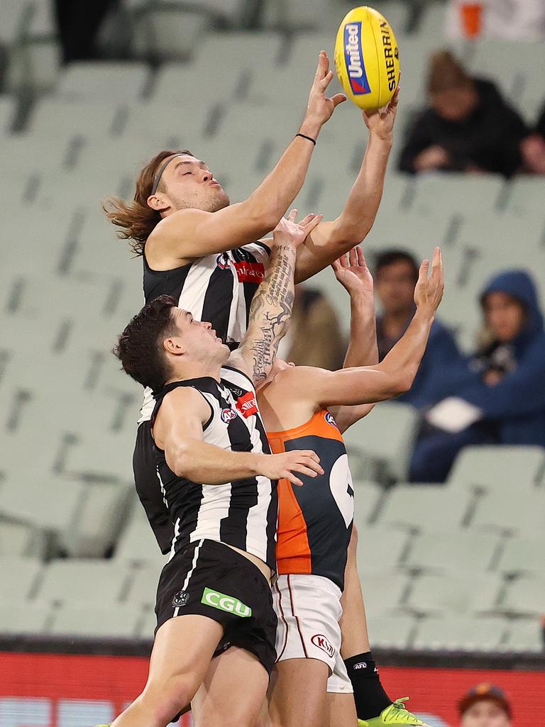 Darcy Moore flies for a mark against GWS. Picture: Michael Klein