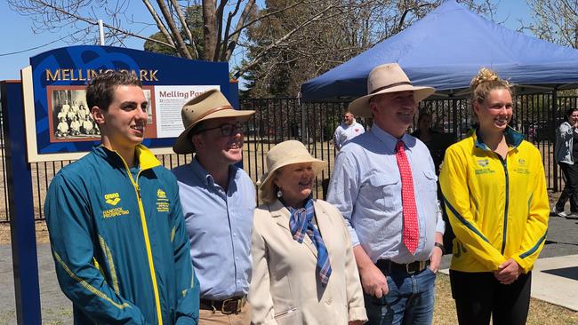 World swimming championship silver medallist Minna Atherton, far right, and world junior swimming championship representative Alexander Grant with dignities at the Melling Park opening.