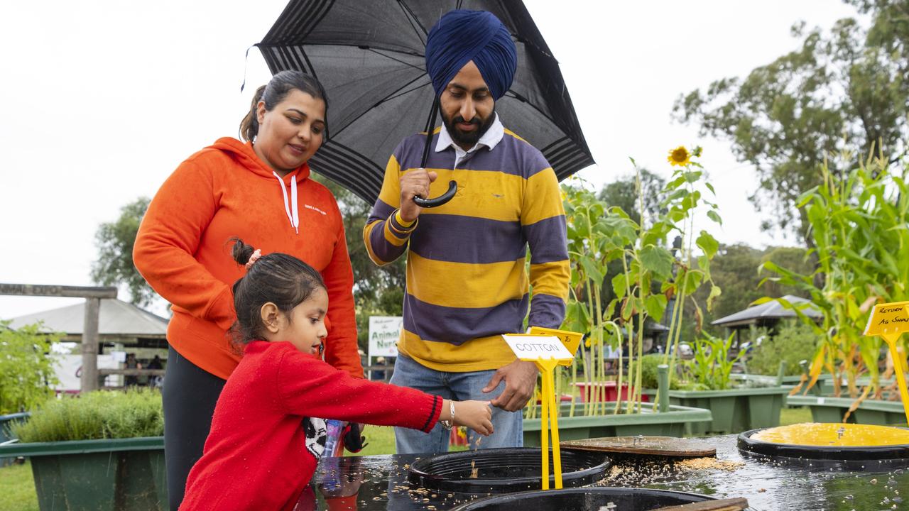 Gurbani Grewal with her mum Aman Grewal and dad Gurkhushdeep Grewal at the 2022 Toowoomba Royal Show, Saturday, March 26, 2022. Picture: Kevin Farmer