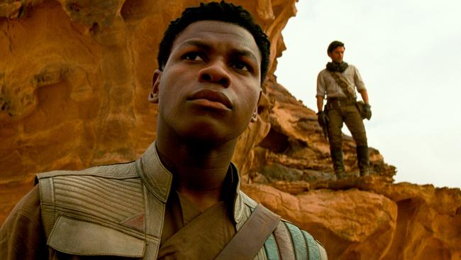 John Boyega says he had a blast filming The Rise Of Skywalker with Oscar Isaac (right) in the Jordanian desert at Wadi Rum.