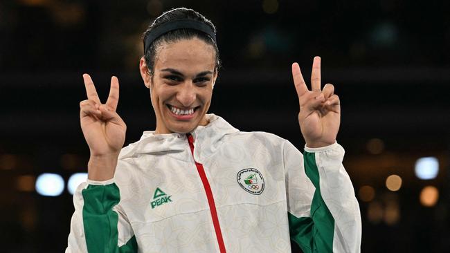 Gold medallist Algeria's Imane Khelif poses on the podium during the medal ceremony. Picture: Mohd Rasfan / AFP