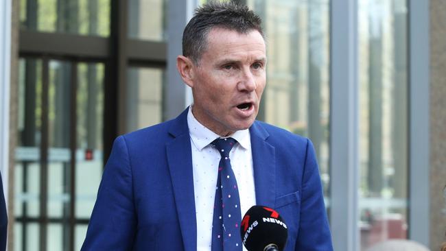 Former MP Andrew Laming leaves Federal Court in Sydney after the resolution of his defamation hearing against Nine. Picture: John Feder