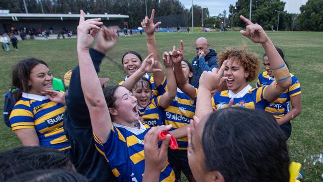 Uni celebrating at the final whistle.