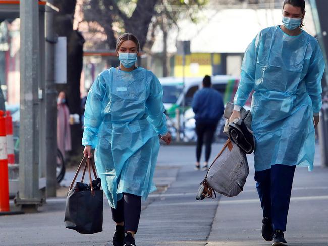 16/07/20 Nurses walk outside the Royal Melbourne Hospital. Aaron Francis/The Australian