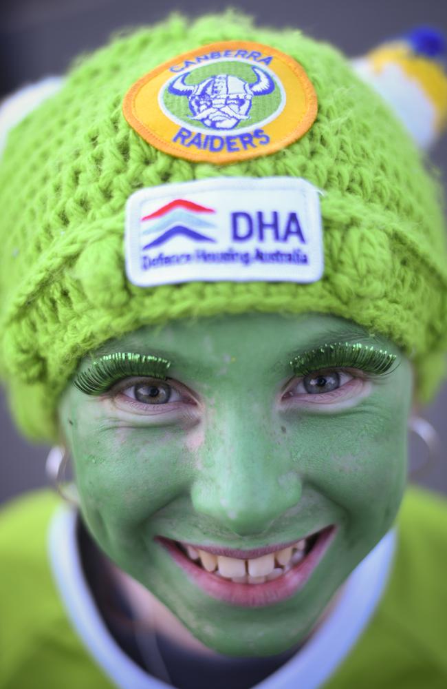 A young Raiders fan shows her colours before this year’s preliminary final. Picture: AAP Image/Lukas Coch