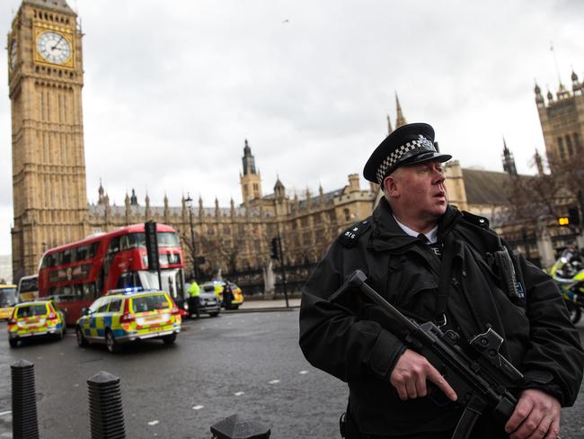 An armed police officer stands guard near Westminster Bridge. Picture: Jack Taylor/Getty Images