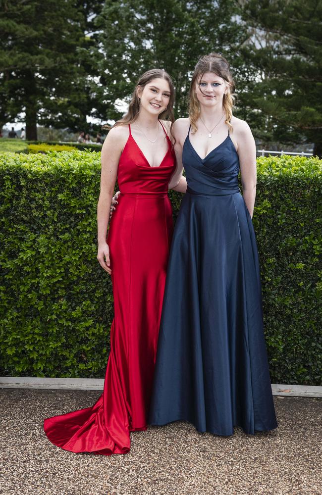 Hayley Fraser (left) and Tamika Dobson at Centenary Heights State High School formal at Picnic Point, Friday, November 15, 2024. Picture: Kevin Farmer