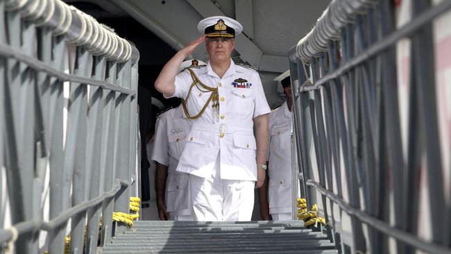 Prince Andrew, the Duke of York, salutes during a visit on the Indian aircraft carrier INS Viraat at the Western Naval Command in Mumbai in 2012.