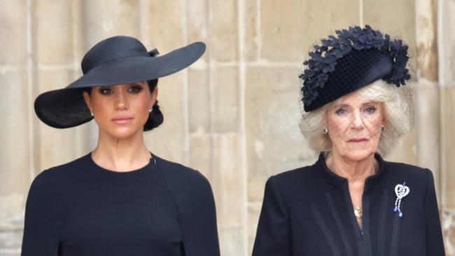 Meghan, Duchess of Sussex and Camilla, Queen Consort are seen during The State Funeral Of Queen Elizabeth II at Westminster Abbey on September 19, 2022 in London, England. Elizabeth Alexandra Mary Windsor was born in Bruton Street, Mayfair, London on 21 April 1926. She married Prince Philip in 1947 and ascended the throne of the United Kingdom and Commonwealth on 6 February 1952 after the death of her Father, King George VI. Queen Elizabeth II died at Balmoral Castle in Scotland on September 8, 2022, and is succeeded by her eldest son, King Charles III. (Photo by Chris Jackson/Getty Images) *** BESTPIX ***