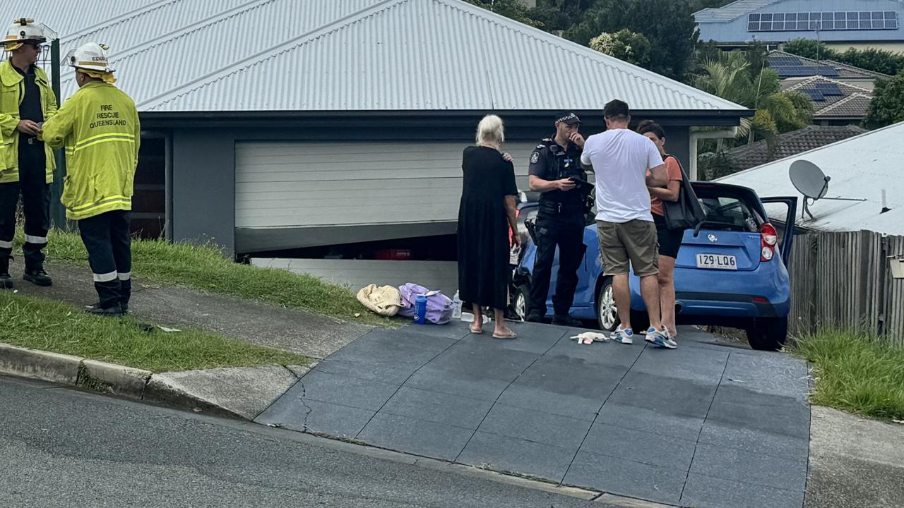 Three-car prang leaves car buried in house