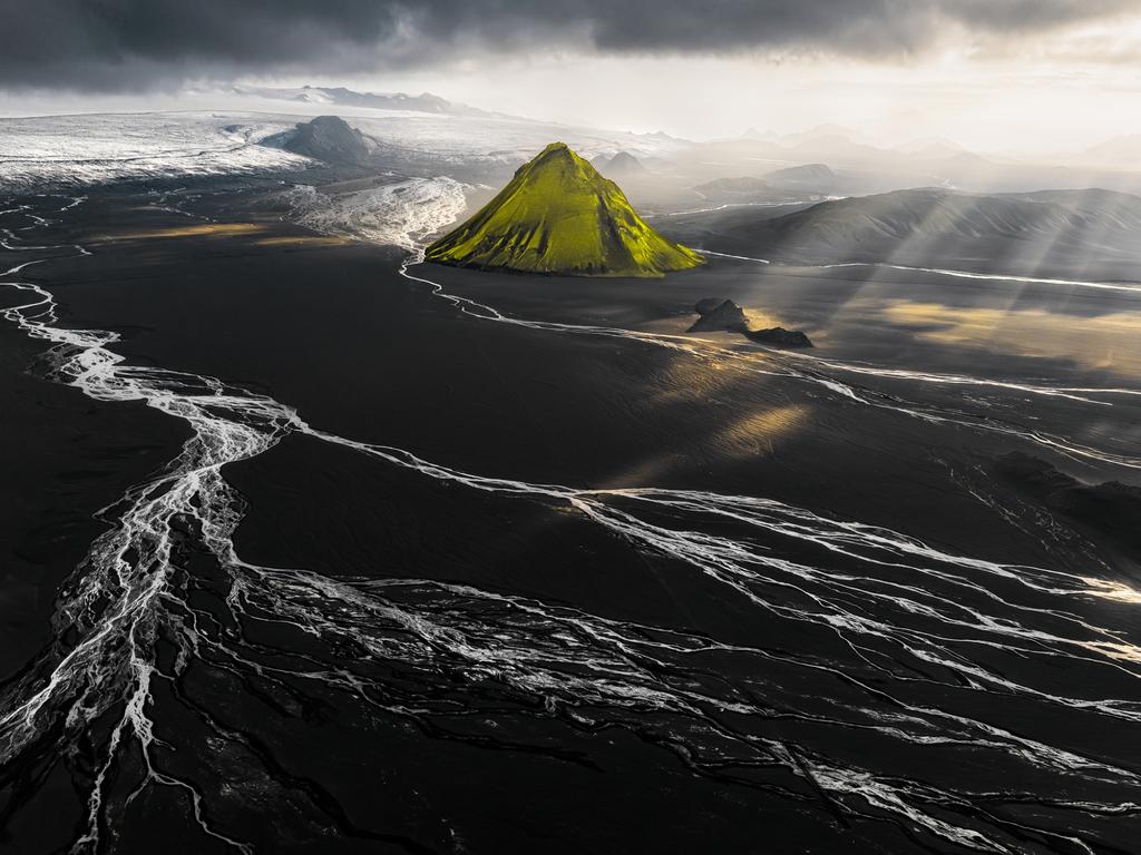 Sun shines down on the Mailfell volcano in Iceland. Picture: Marco Capitanio