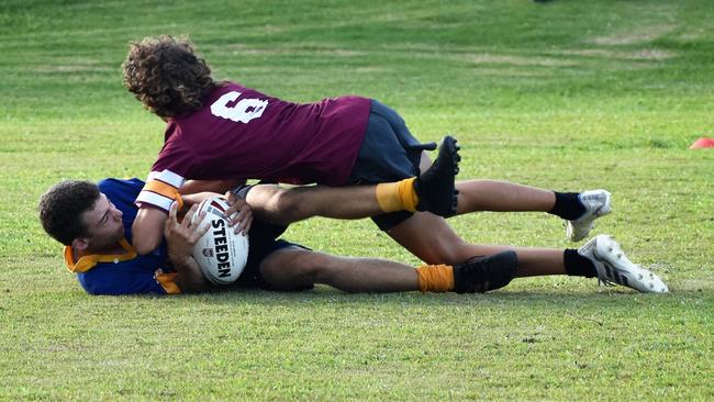 Best and fairest player of the tournament Brandon Hamilton-Kaurila scores. Photographs from the Will Murdoch Perpetual Shield. The annual U14 rugby league competition, in its second year, involved Gilroy Santa Maria College, Ingham State High School and St Teresa's Catholic College Abergowrie. Picture: Cameron Bates