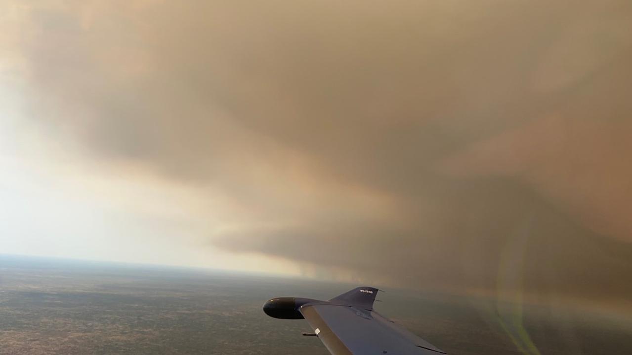 A wildfire in the Barkly region has burnt more than 9300sq km, calling for interstate water bombers to help fight the “uncontrolled” blaze. Picture: Bushfires NT