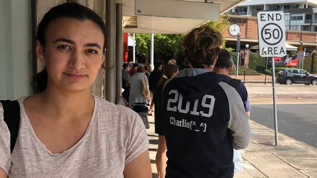 Krissy Bryant, 27, of Manly, waits in a two-hour queue outside the Centrelink office at Brookvale so she can sign on for Federal Government financial assistance after losing his job because of the COVID-19 shutdown. Picture: Jim O'Rourke