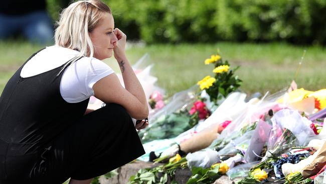 Flowers at the scene of where Hannah Clarke and her three children were murdered. Picture: Liam Kidston