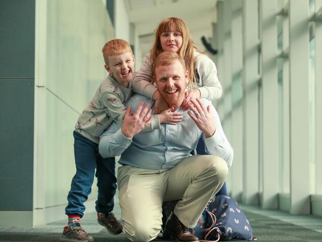 Brendon Hunt with his children Holly, 7, and Stephen, 6. Picture:Justin Lloyd