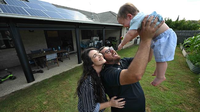 The family bought a home at a lower price than the Greater Brisbane average, wit plenty of backyard room for their child to grow and play. Picture: Lyndon Mechielsen/Courier Mail