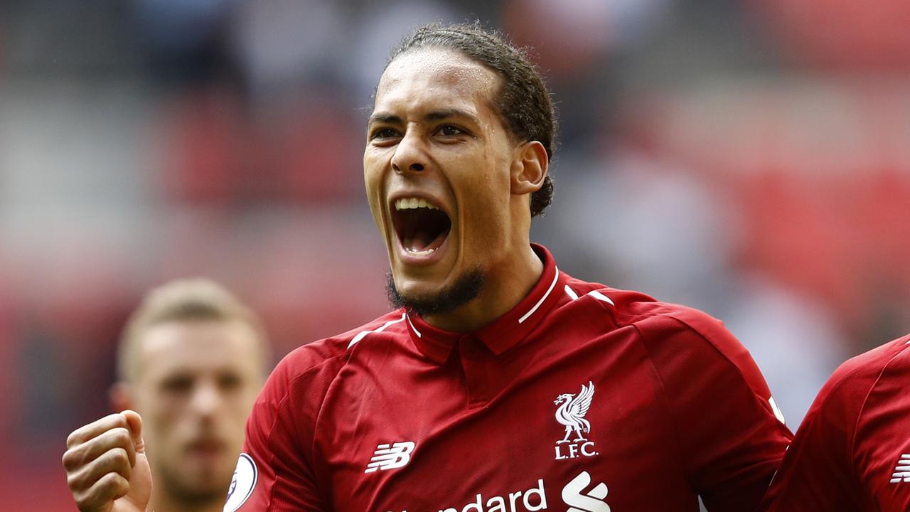 LONDON, ENGLAND - SEPTEMBER 15:  Virgil van Dijk of Liverpool and team mate Joe Gomez celebrate following the Premier League match between Tottenham Hotspur and Liverpool FC at Wembley Stadium on September 15, 2018 in London, United Kingdom.  (Photo by Julian Finney/Getty Images)