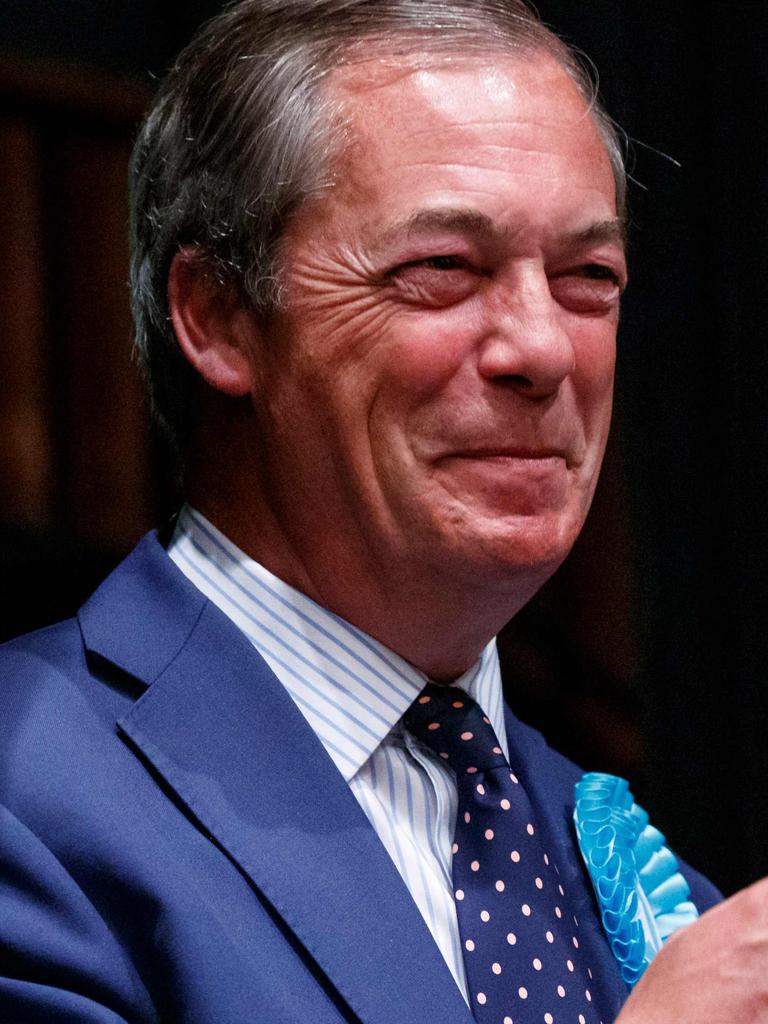 Chuffed: Nigel Farage has won the highest number of seats for a UK party and is ready to fight a UK election. Picture: Tolga Akmen/AFP.