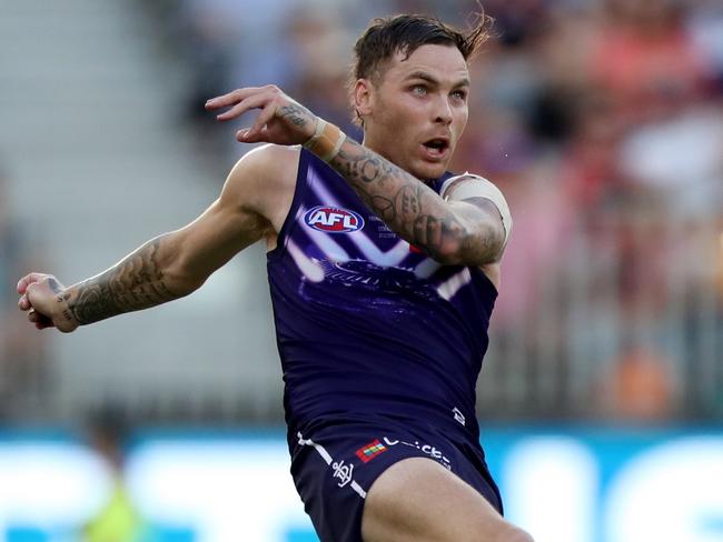 Nathan Wilson of the Dockers kicks during the Round 2 AFL match between the Fremantle Dockers and the Essendon Bombers at Optus Stadium in Perth, Saturday, March 31, 2018. (AAP Image/Richard Wainwright) NO ARCHIVING, EDITORIAL USE ONLY