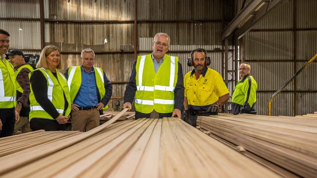 Prime Minister Scott Morrison announces support for the timber industry on a visit to Neville Smith Forest Products in Launceston. Picture: Jason Edwards