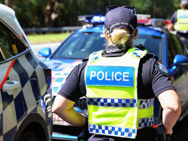 Cairns police have begun National Road Safety Week with a safety blitz. A Queensland Police traffic officer performs a random breath test on the Captain Cook Highway at Aeroglen. Picture: Brendan Radke