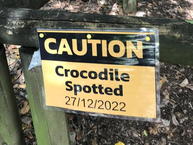 A sign at the Anglers Parade beach entrance at Blacks Beach about a crocodile sighting on December 27, 2022. Picture: Facebook