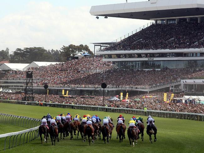 Doesn’t get much better than this: Efficient (widest runner) begins his long sustained run to victory as the field enters the straight in the 2007 Melbourne Cup. Picture: Ian Currie