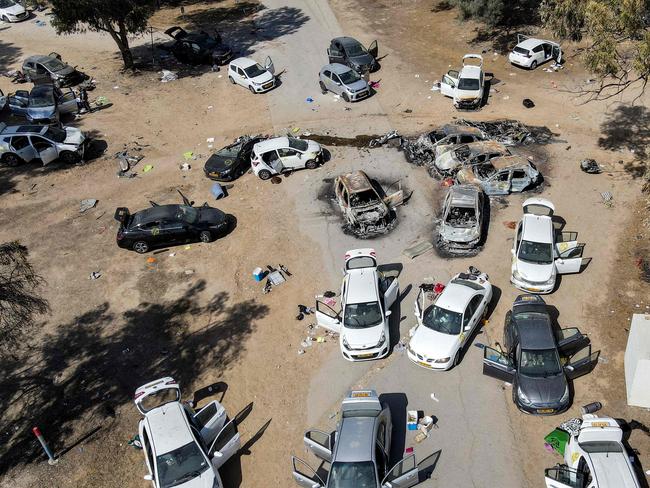 Aabandoned and torched vehicles at the site of the October 7 attack on the Supernova music festival. Picture: Jack Guez