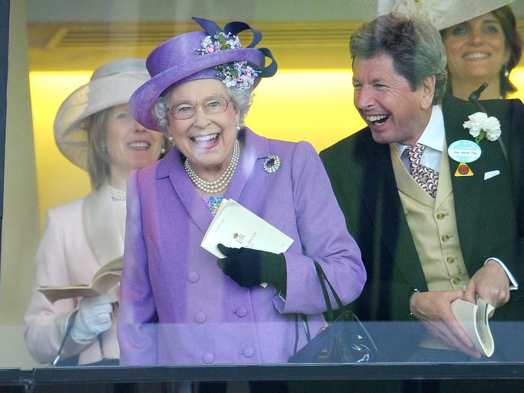 You will never see the Queen happier than when she is trackside. Picture: AP Photo / Tim Ireland/PA