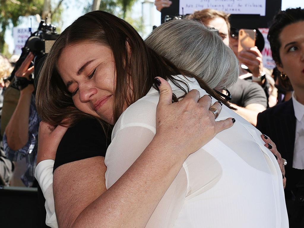 Brittany Higgins embraced March 4 Justice organiser Janine Hendry at the rally outside Parliament House. Picture: NCA NewsWire/Gary Ramage