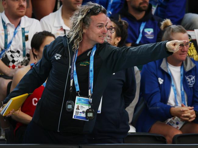 World Short Course Swimming Championships at Melbourne Sports and Aquatic centre, Melbourne. Womens 4 x 50 Medley relay. Australian relay coach dean Boxall cheers the girls relay team on their way to gold. Picture by Michael Klein